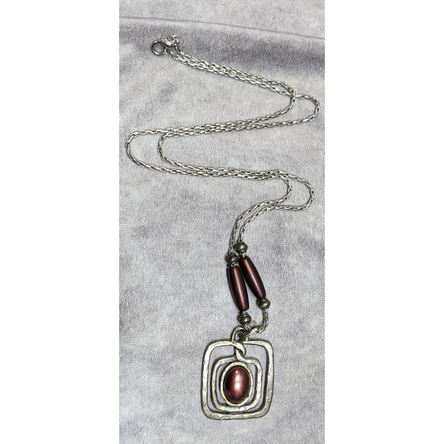 Brutalist Abstract Silver Tone Pendant Necklace With Burgundy Metallic Accents