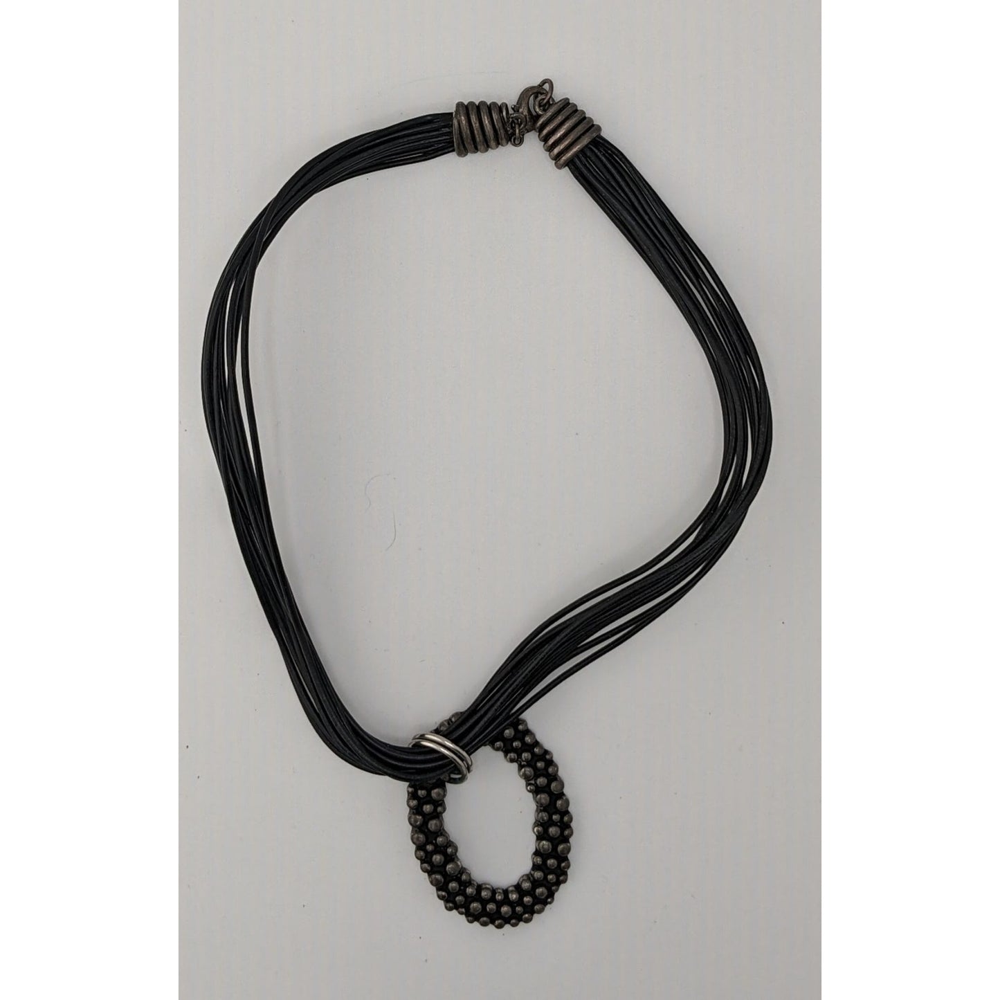 Bohemian Black Multi-Strand Necklace With Bubble Textured Oval Pendant