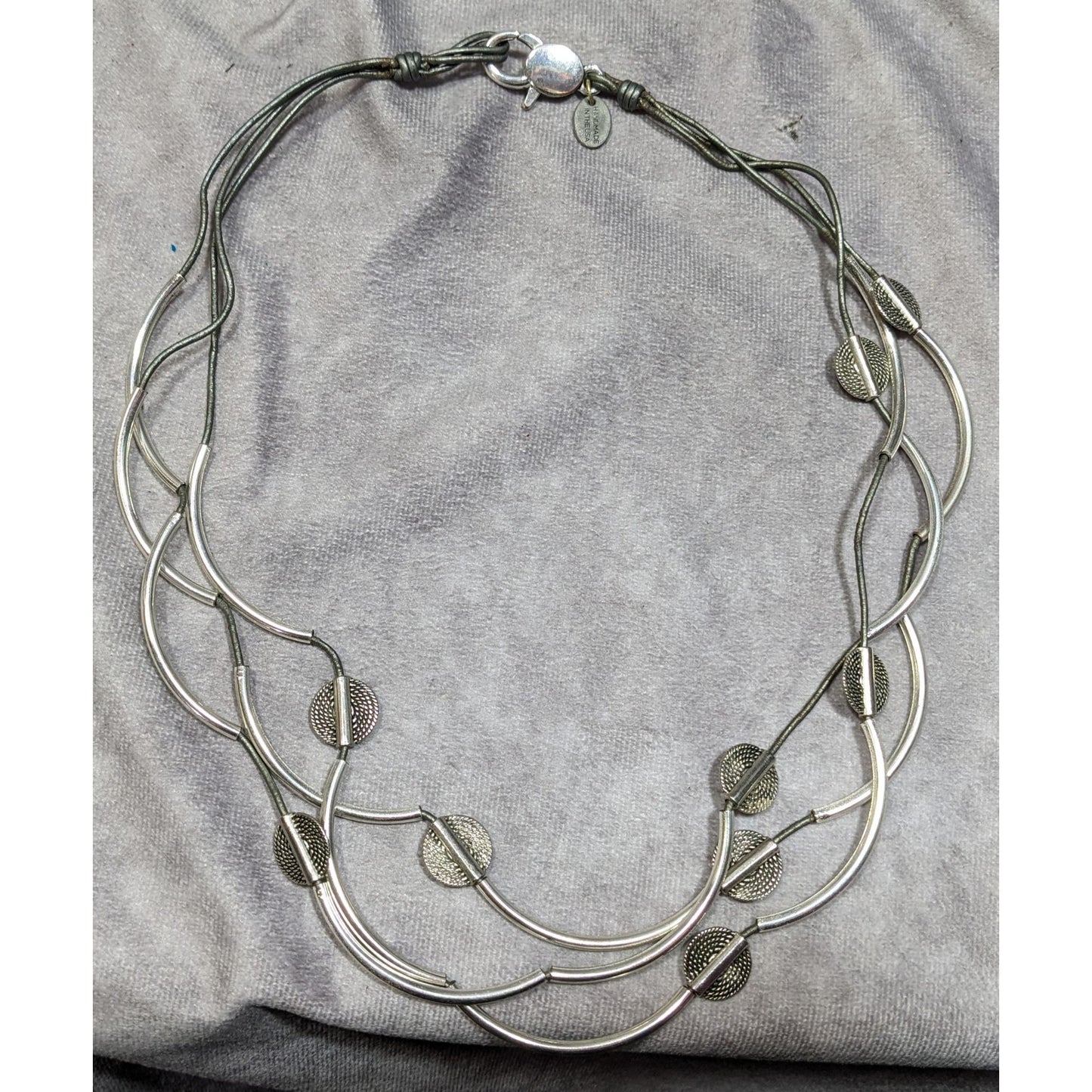Lizzy James Abstract Disc And Curved Bar Silver Tone Metal And Leather Necklace