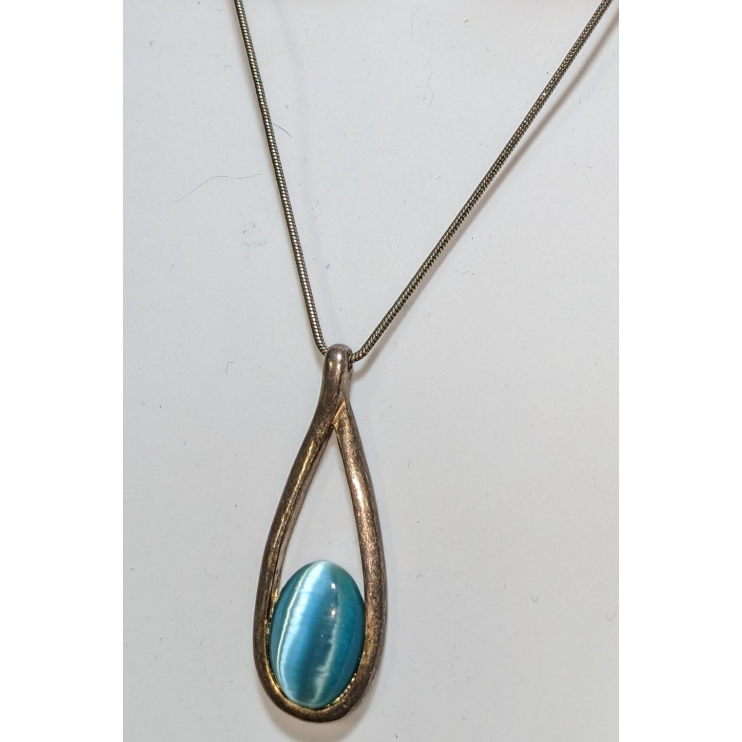 Whimsical Teardrop Pendant Necklace With Blue Cat Eye Stone