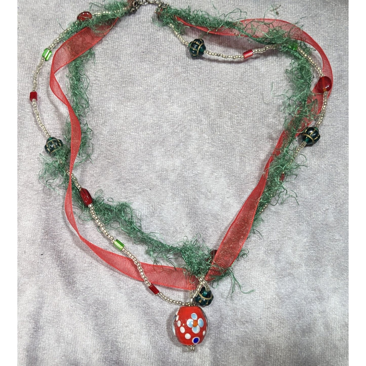 Abstract Floral Holiday Themed Red And Green Pendant Necklace