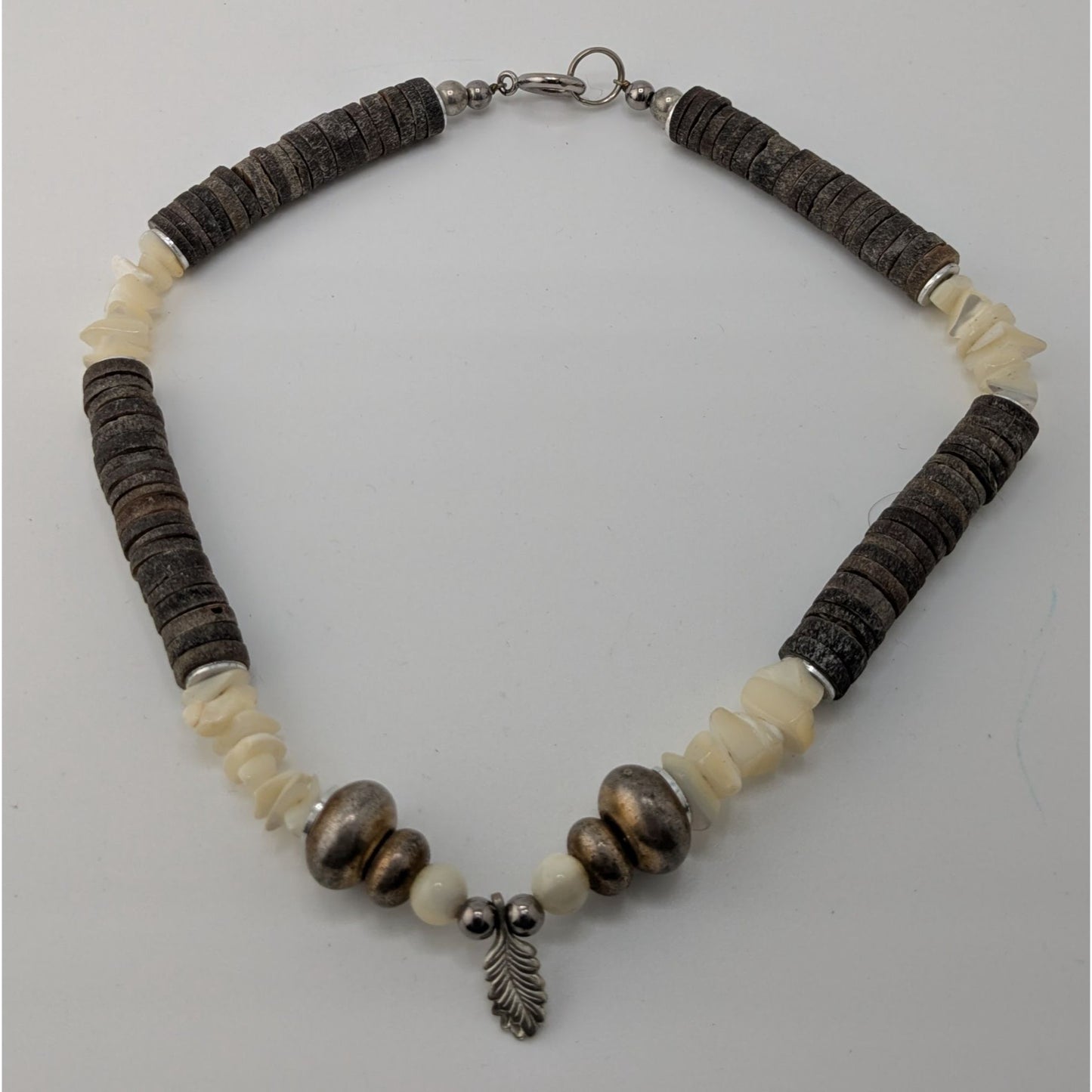 Vintage Beachy Santo Domingo Heishi Necklace With Shell And Mother Of Pearl Beads Featuring A Silver Feather Accent