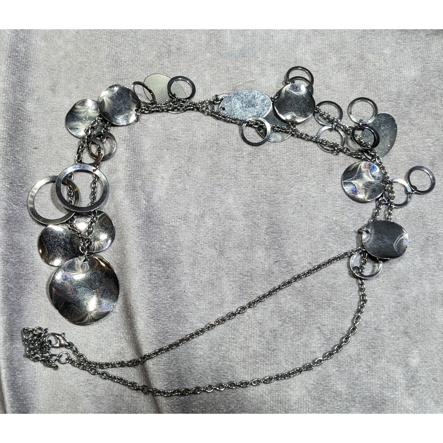 Jingling Disc And Open Circle Charm Silver Tone Necklace