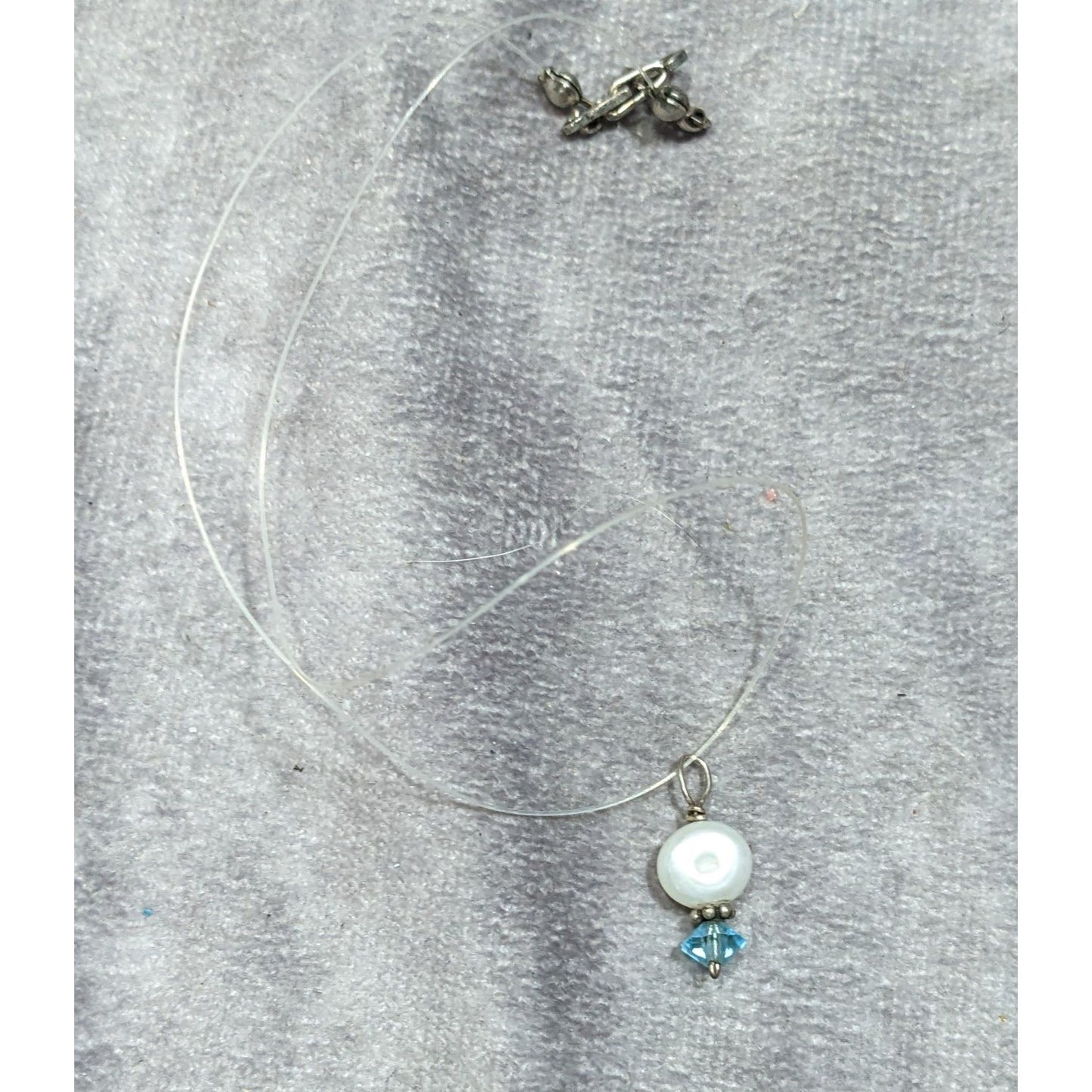 Dainty Pearl & Blue Crystal Pendant On Clear Wire Necklace With Clasp Closure