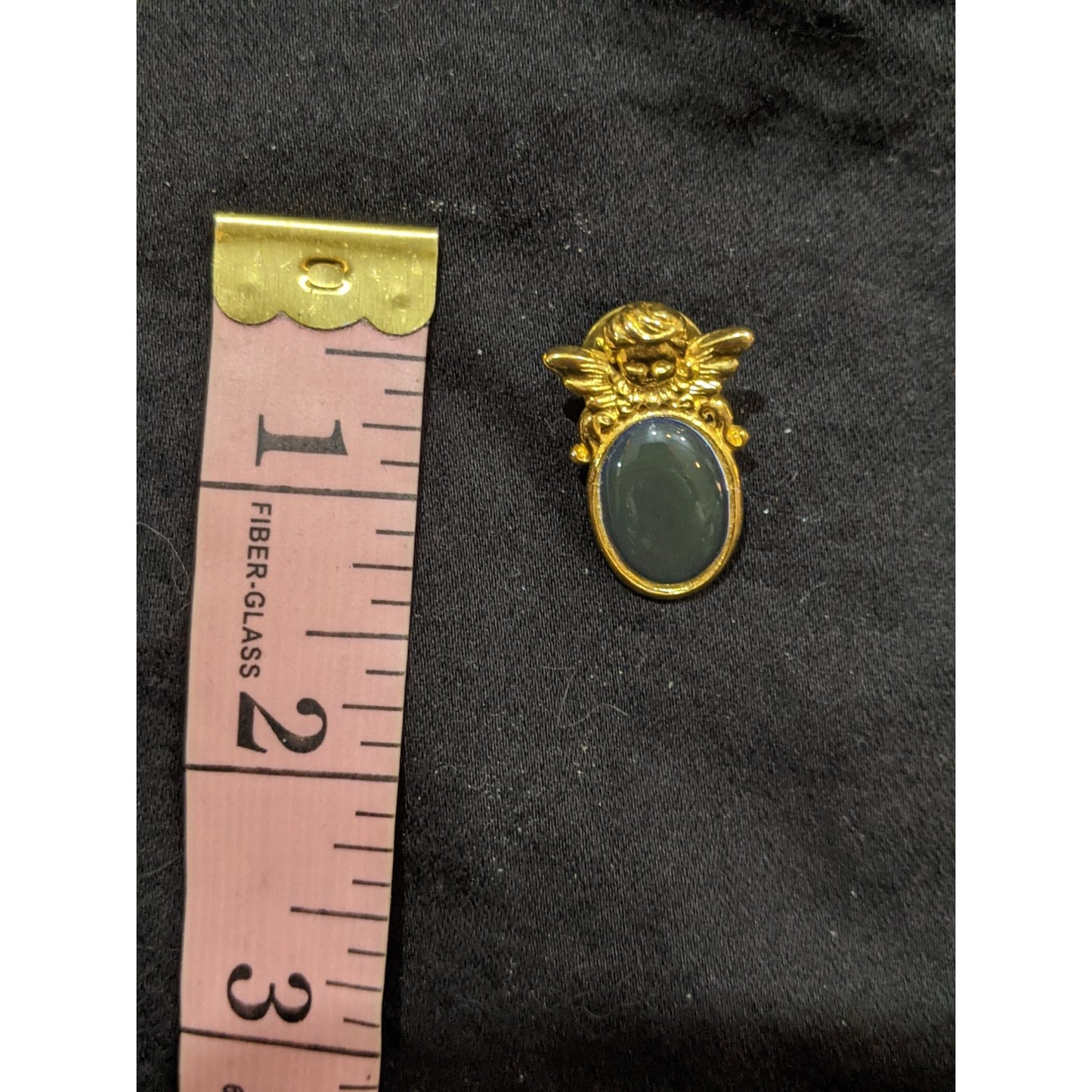 Vintage Gold Tone Cherub Pin With Green Cabochon