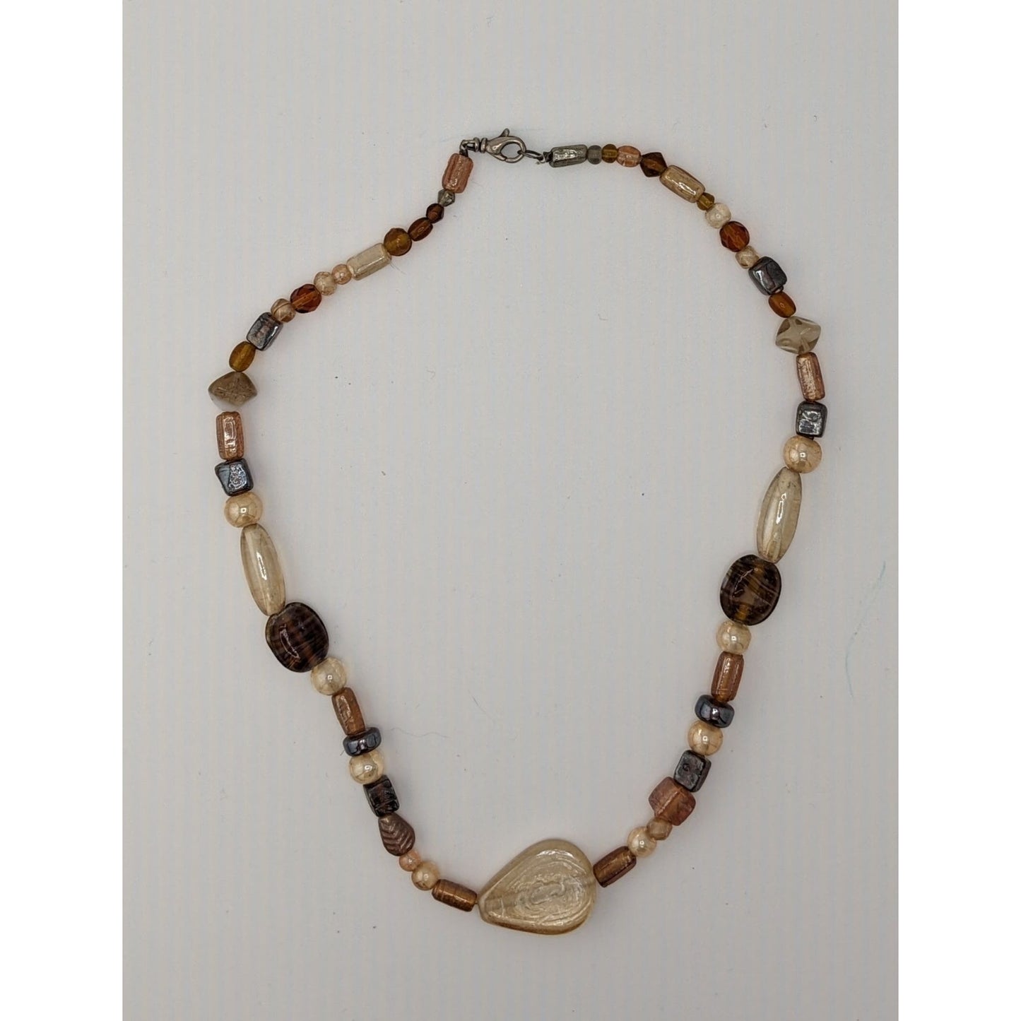Earthy Glass Beaded Necklace With Teardrop Pendant
