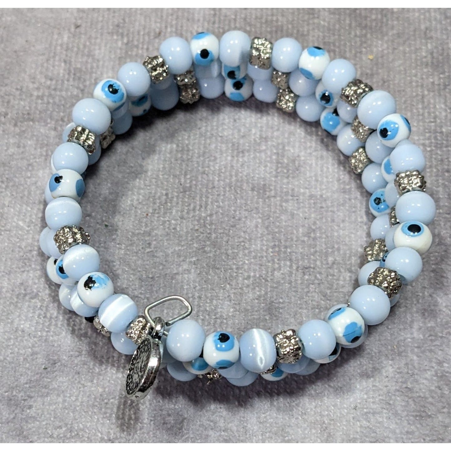 Bohemian Evil Eye Light Blue Glass And Silver Tone Beaded Coil Bracelet