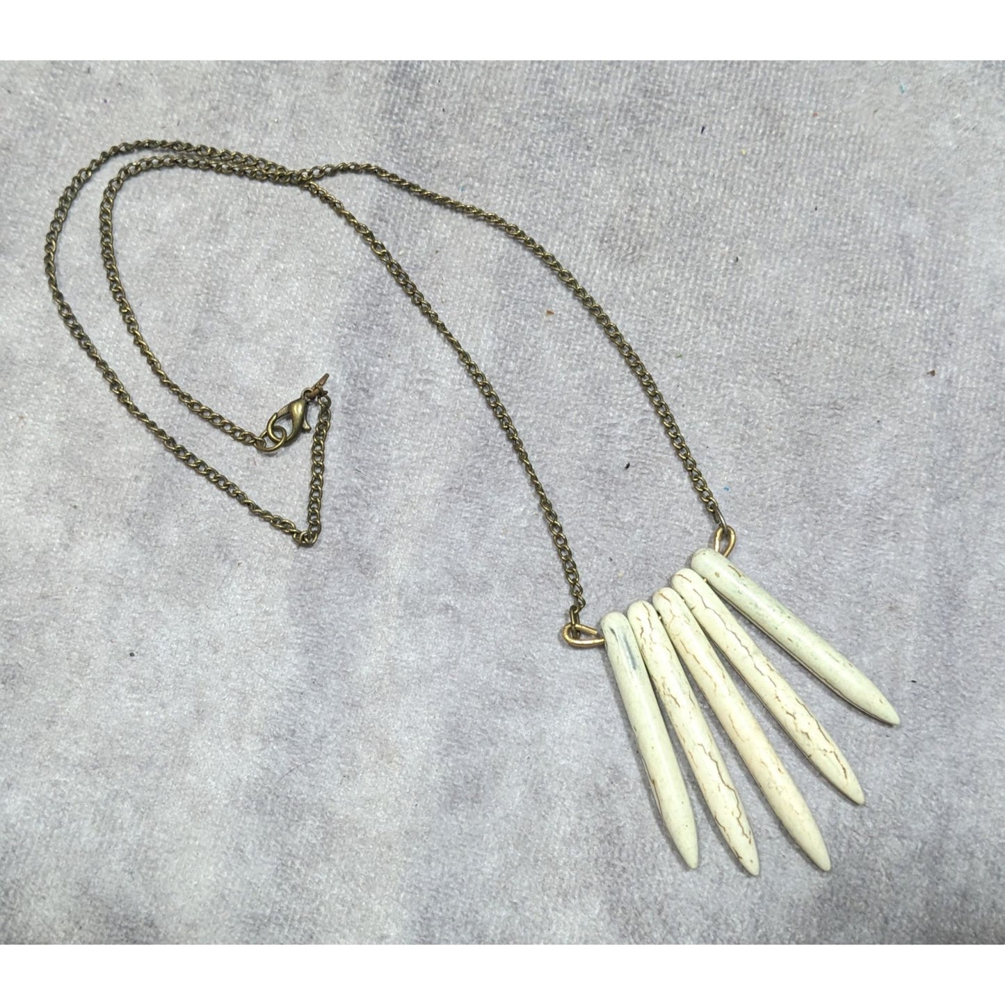Howlite Graduated Spike White And Gold Tone Pendant Necklace