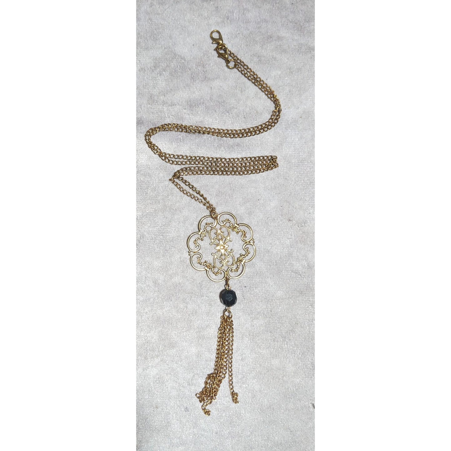 Gold Pressed Floral Bohemian Tassel Necklace