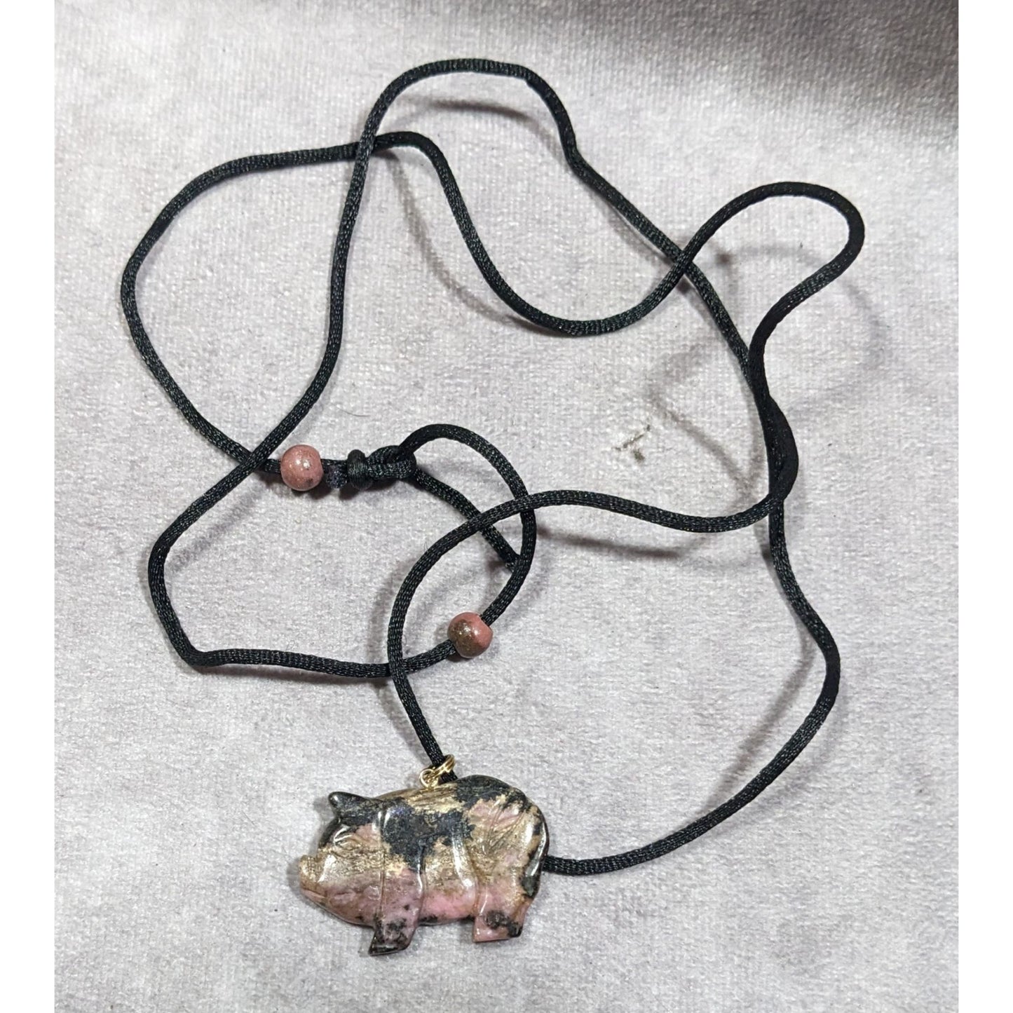 Carved Pink And Black Rhodonite Pig Pendant Necklace