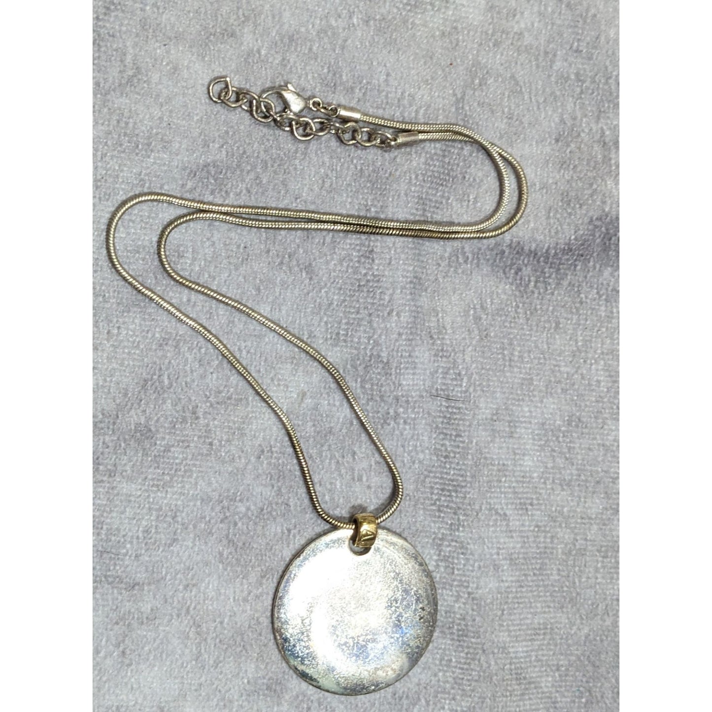Modern Medallion Silver Tone Pendant Necklace With AK Engraved Gold Tone Bail