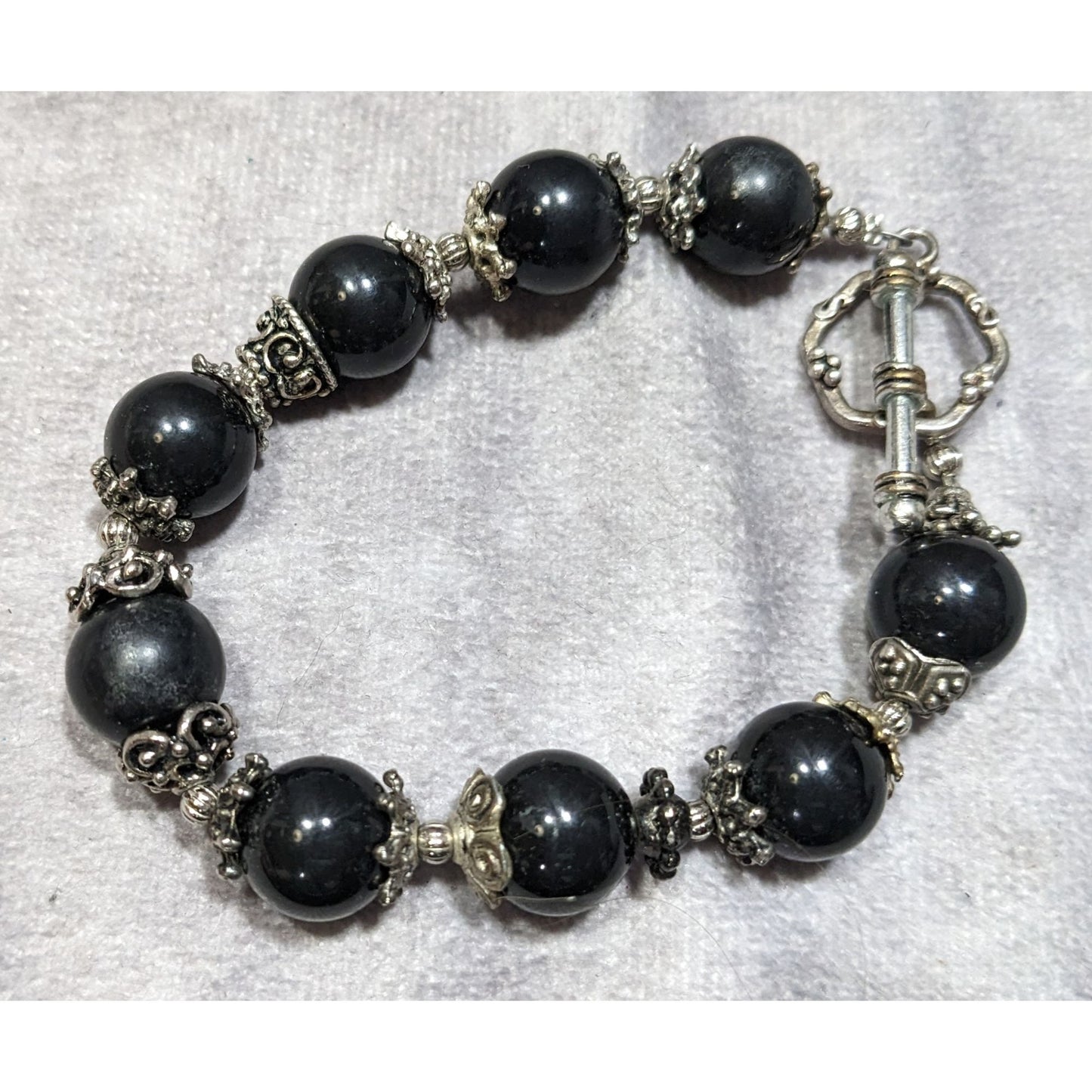 Handcrafted Gothic Black Beaded Bracelet With Intricate Silver Accents