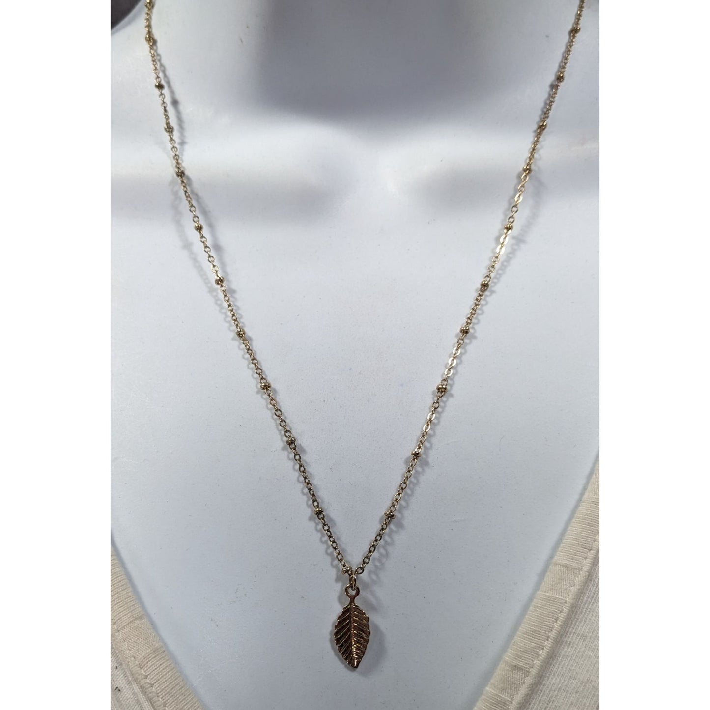 Minimalist Leaf Shaped Gold Tone Pendant Necklace