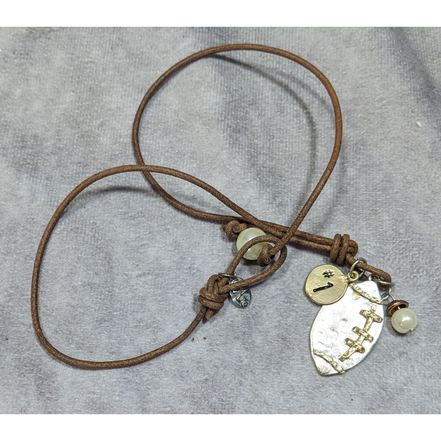 Crave Football Metallic Pendant Necklace With Charm Accents