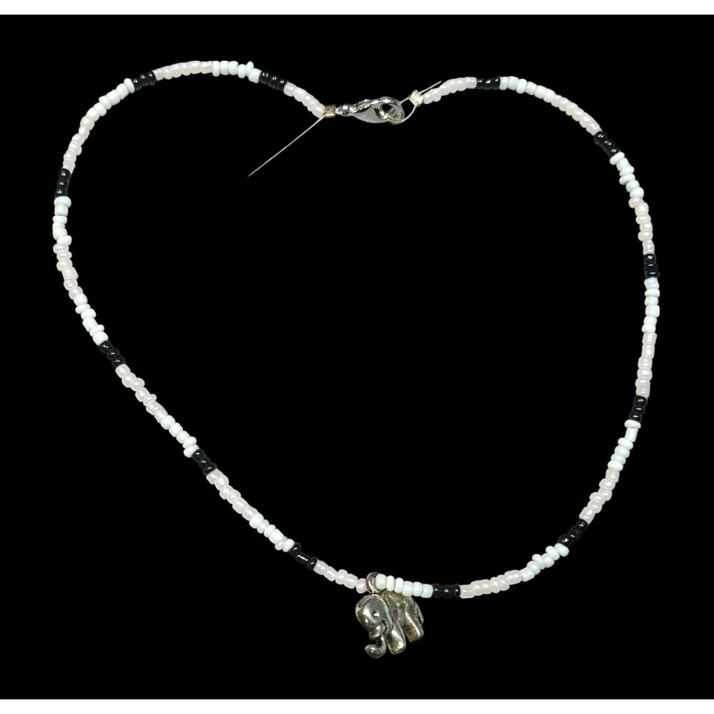 90s Bohemian Black And White Glass Beaded Necklace With Silver Tone Elephant Charm