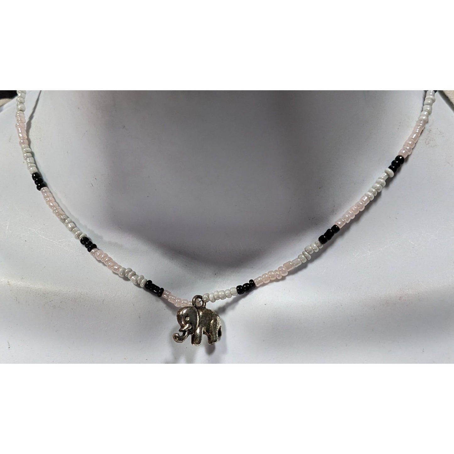 90s Bohemian Black And White Glass Beaded Necklace With Silver Tone Elephant Charm