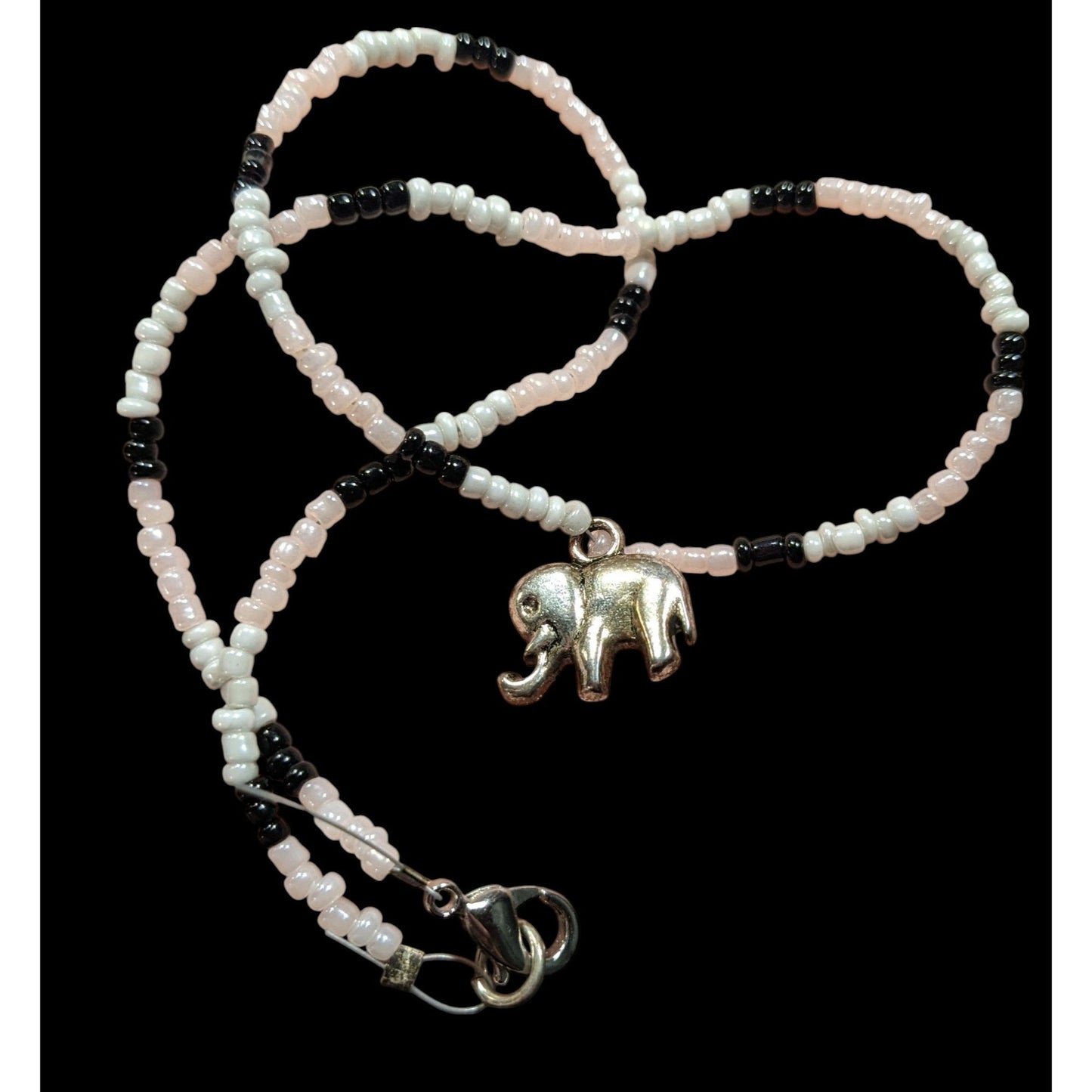 90s Bohemian Black And White Glass Beaded Necklace With Silver Tone Elephant Charm
