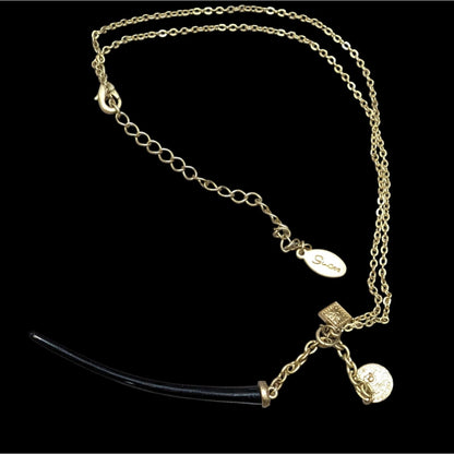 Guess Abstract Claw And Charm Black And Gold Tone Necklace