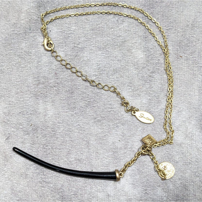 Guess Abstract Claw And Charm Black And Gold Tone Necklace
