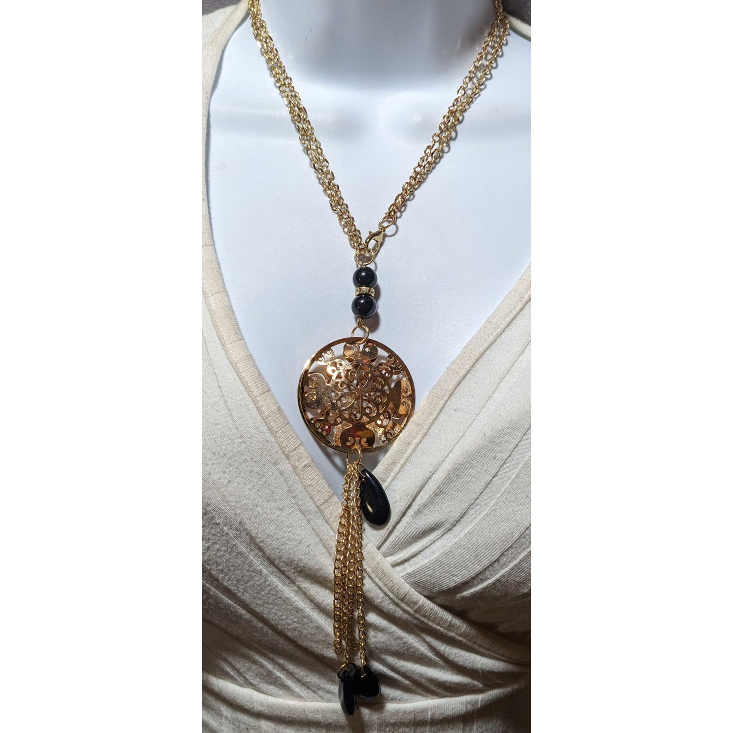 Gold Floral Crystal Filled Pendant Tassel Necklace