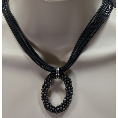 Bohemian Black Multi-Strand Necklace With Bubble Textured Oval Pendant