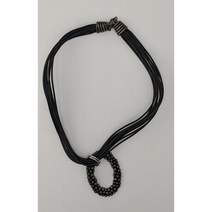 Bohemian Black Multi-Strand Necklace With Bubble Textured Oval Pendant