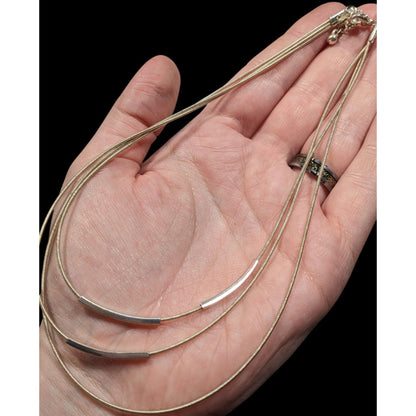 Modern Layered Silver Tone Coil Wire Necklace With Tube Bead Accents
