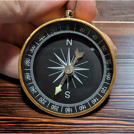 Gold And Black Compass