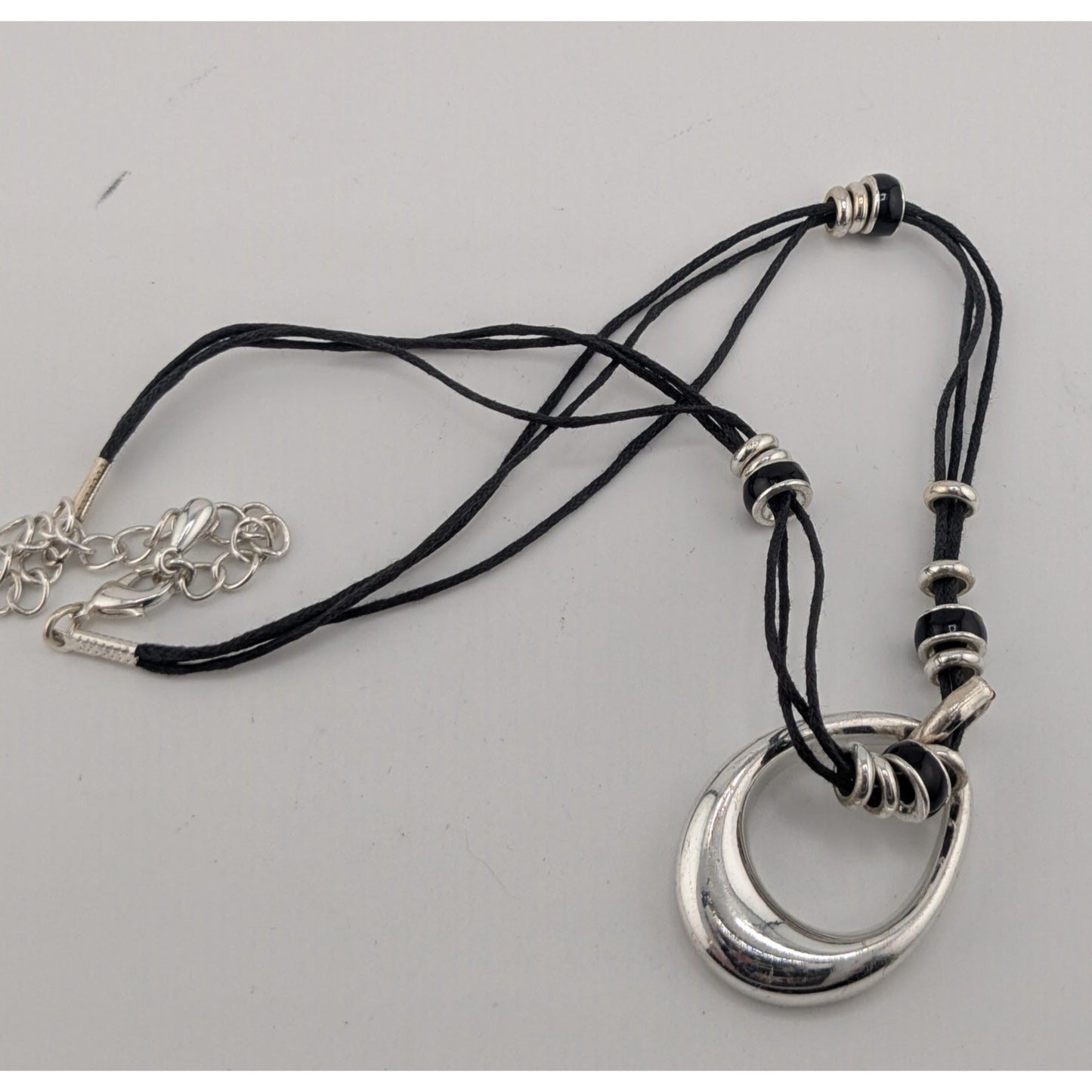 Modern Teardrop Silver-Tone Pendant Necklace With Black Cord & Bead Accents Adjustable