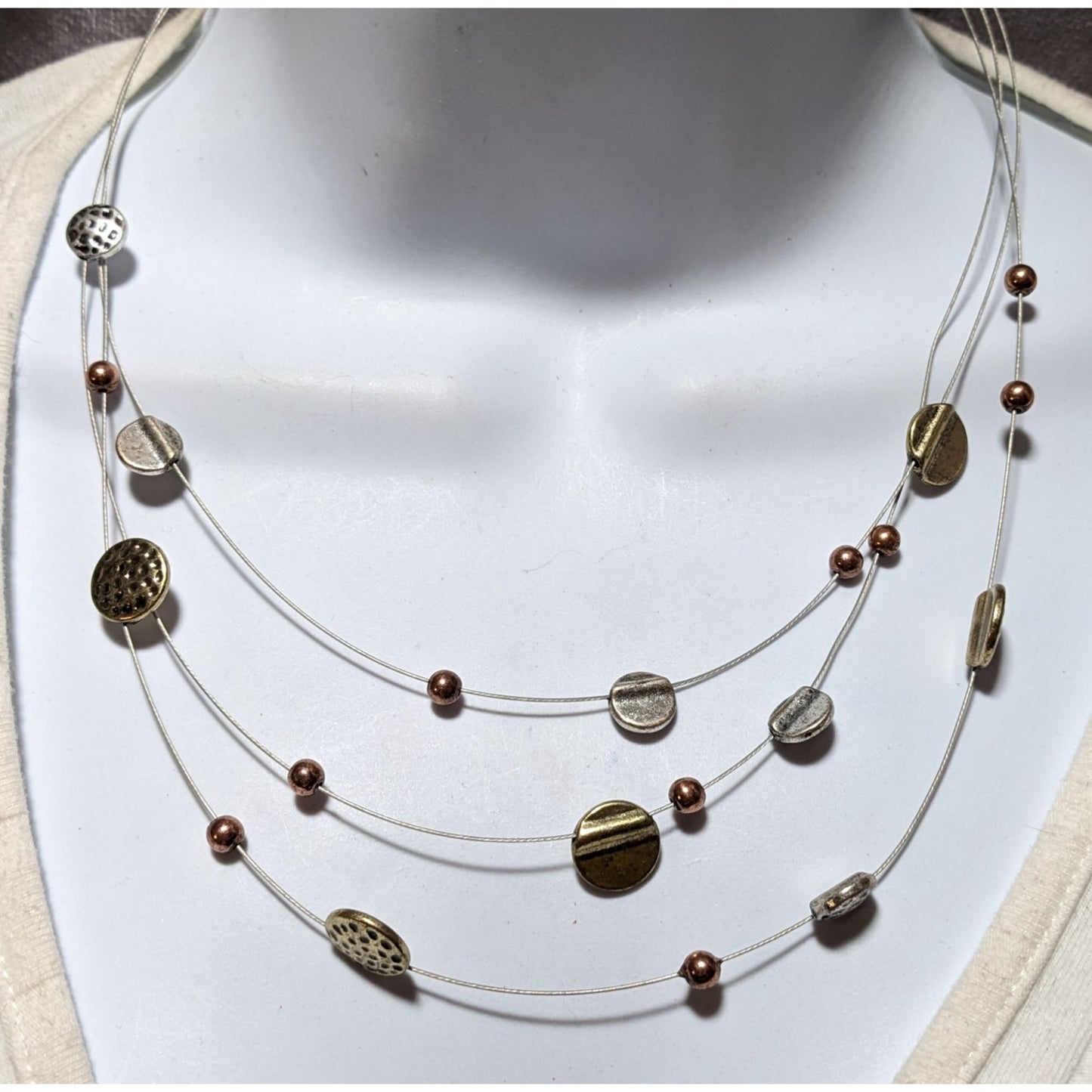 Metallic Disc Floating Necklace.