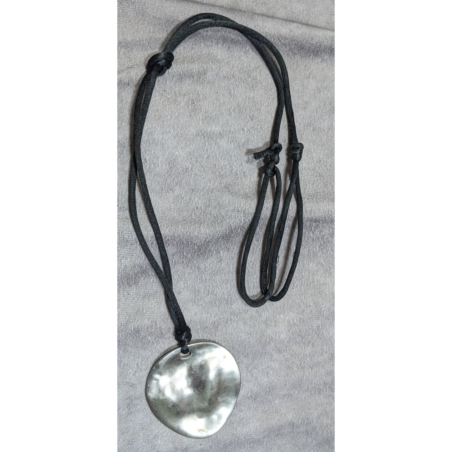 Brutalist Hammered Silver Tone Organic Disc Pendant Necklace On Black Silk Cord