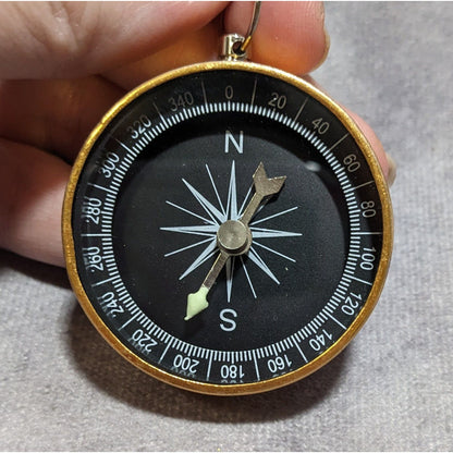 Gold And Black Compass