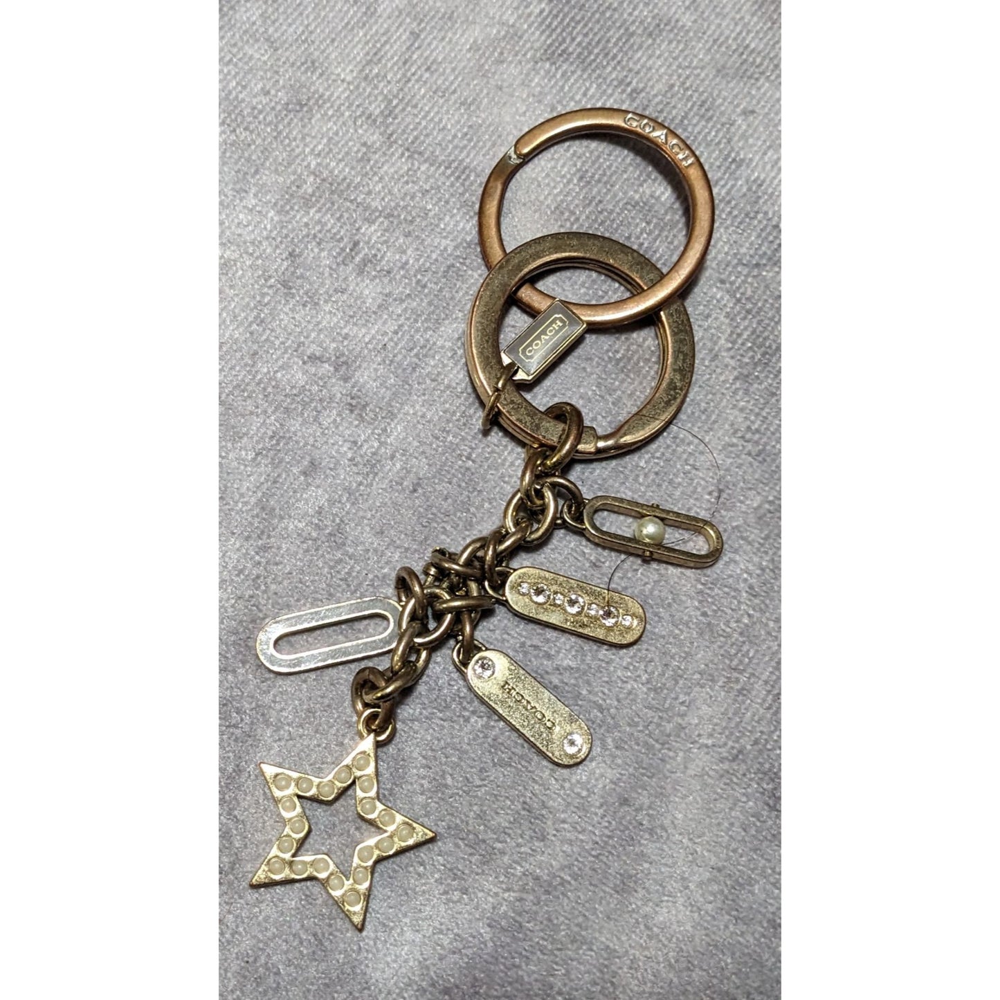 Coach Gold Tone Rhinestone Faux Pearl Star Charm Keychain