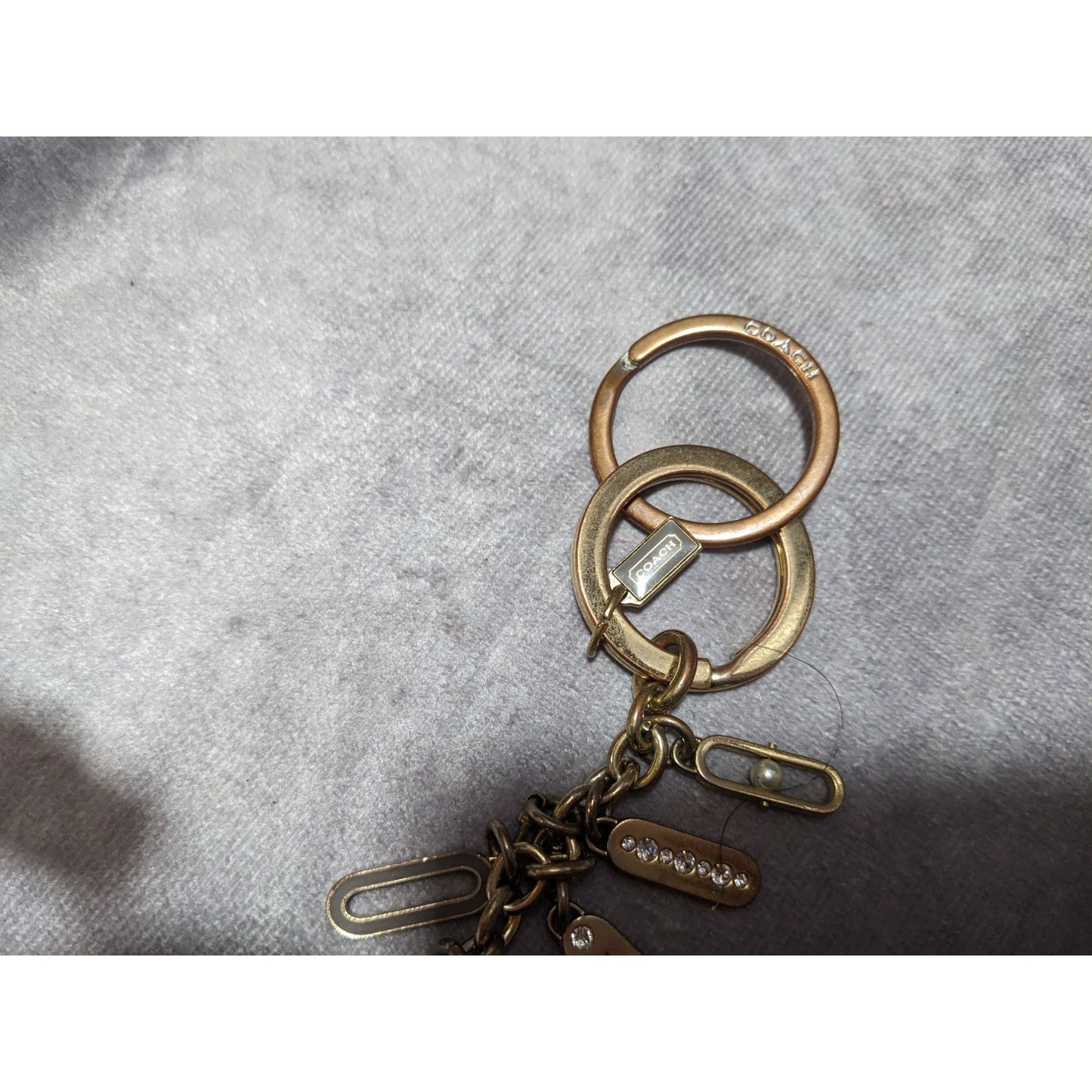 Coach Gold Tone Rhinestone Faux Pearl Star Charm Keychain