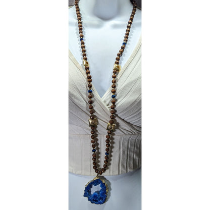 Blue Faux Geode Slice Pendant Necklace With Brown Wood And Gold Tone Metal Beads