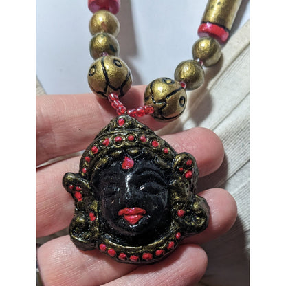 Vintage Black And Gold Deity Pendant Necklace