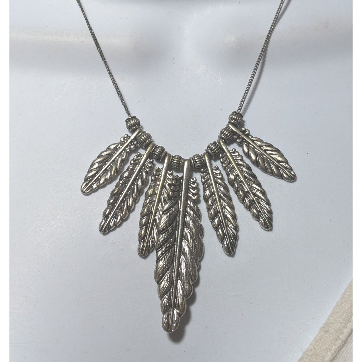 Silver Graduated Feather Charm  Necklace