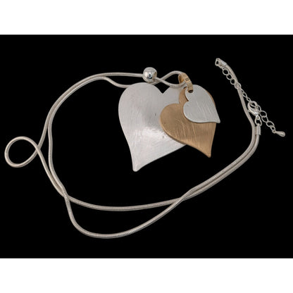 Brutalist Coquette Love Themed Silver & Gold-Tone Layered Heart Pendant Necklace With Snake Chain