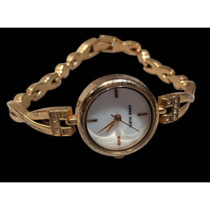 Anne Klein Gold Tone Watch With Rhinestones And Mother Of Pearl Face (Not Tested)