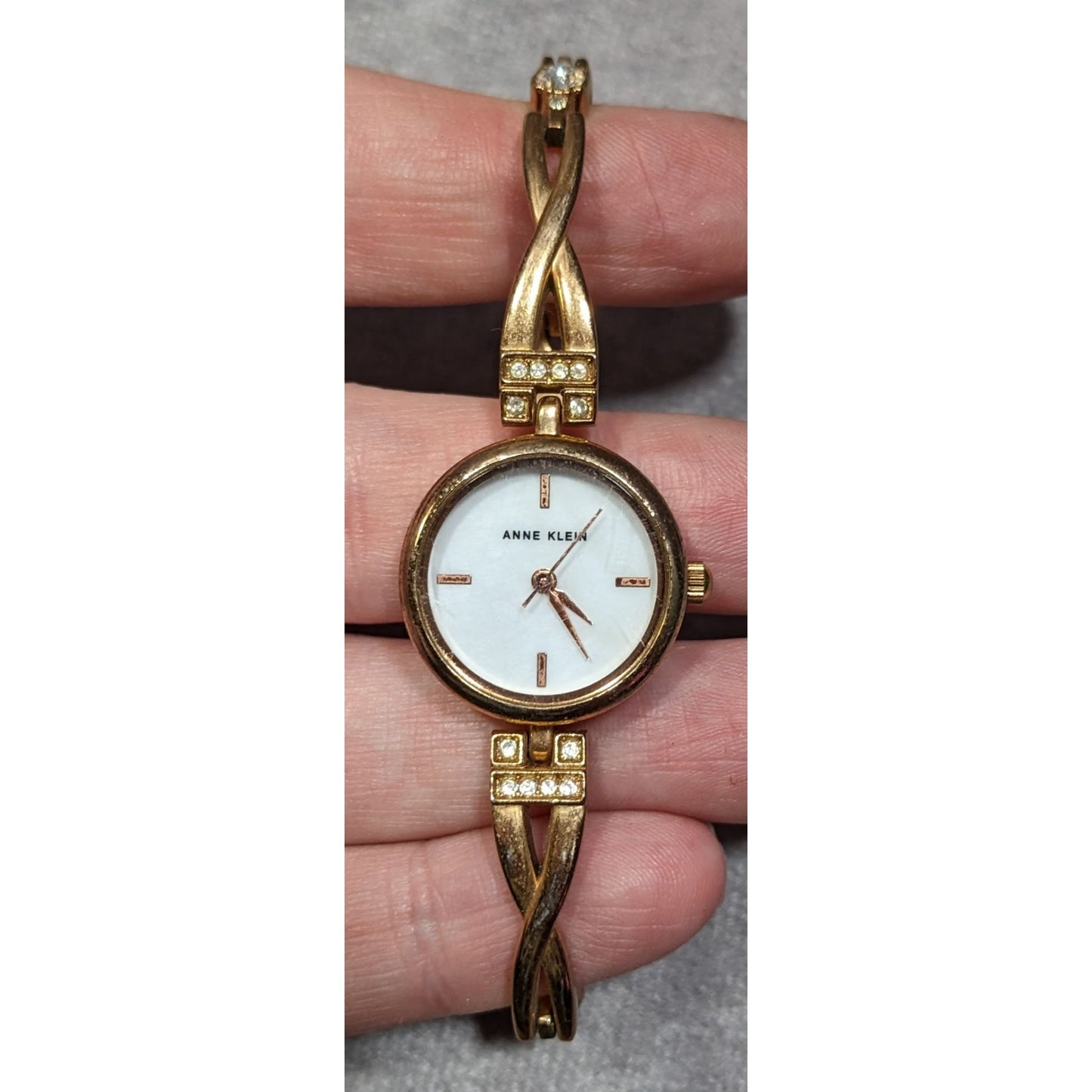 Anne Klein Gold Tone Watch With Rhinestones And Mother Of Pearl Face (Not Tested)