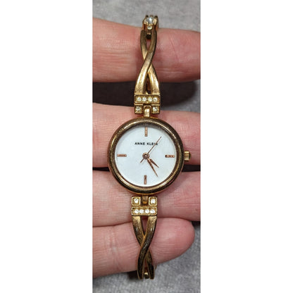 Anne Klein Gold Tone Watch With Rhinestones And Mother Of Pearl Face (Not Tested)