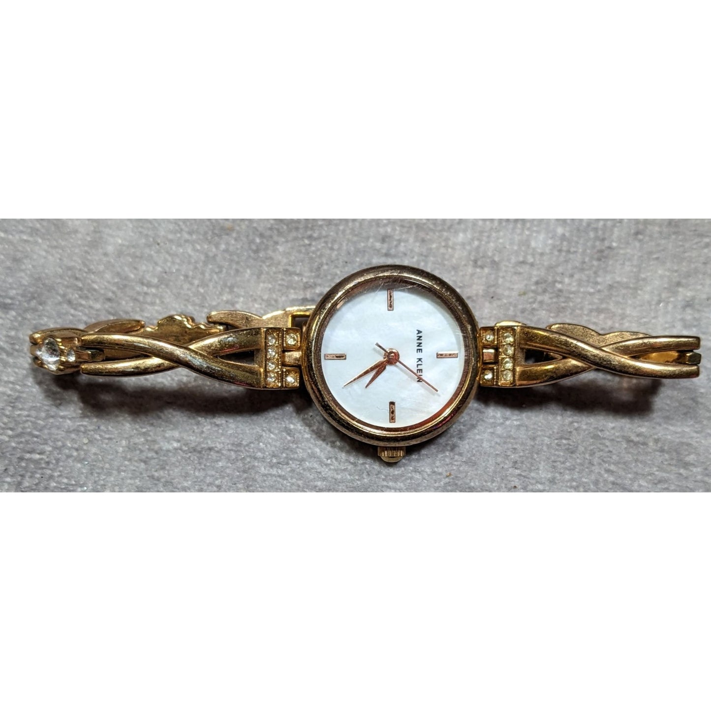 Anne Klein Gold Tone Watch With Rhinestones And Mother Of Pearl Face (Not Tested)