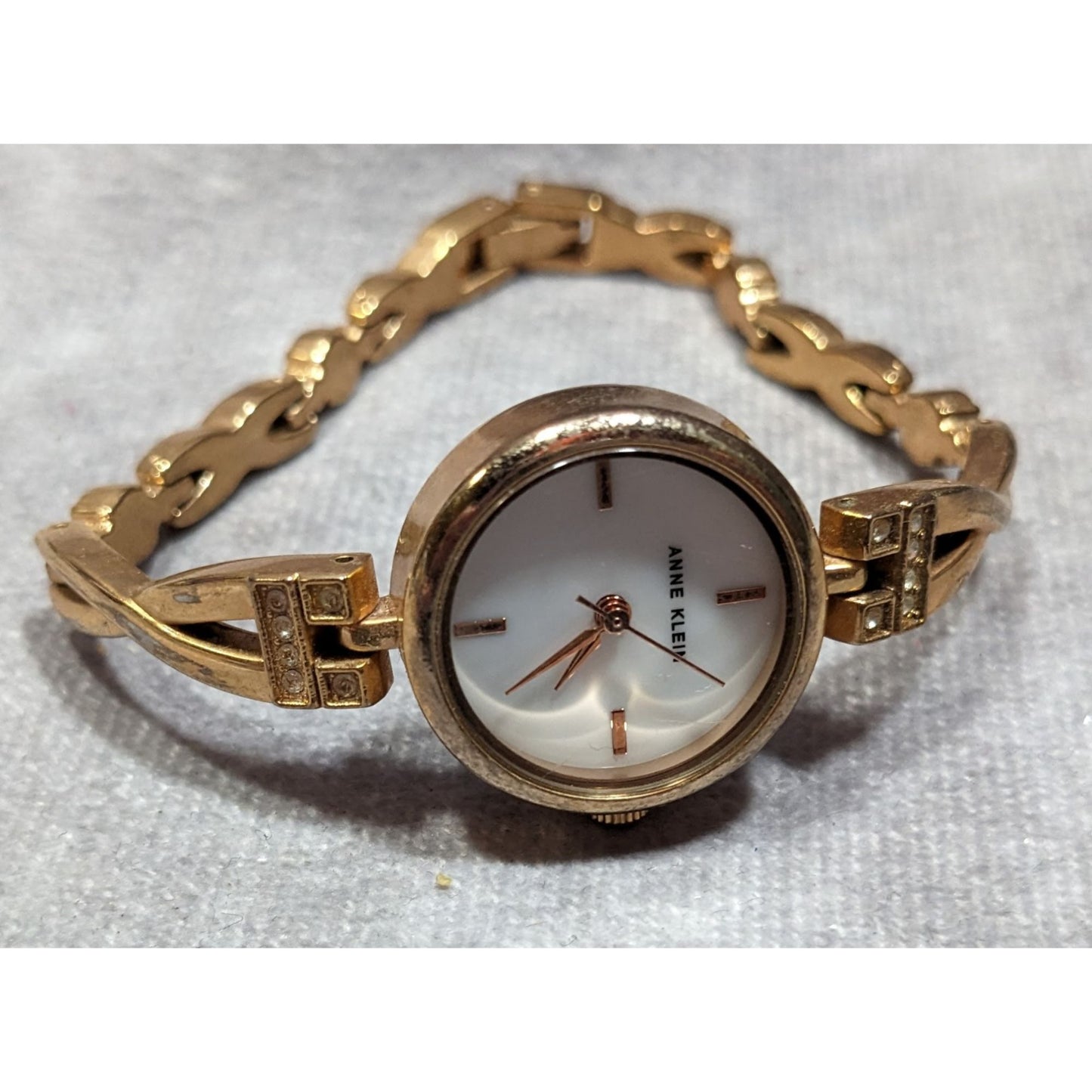 Anne Klein Gold Tone Watch With Rhinestones And Mother Of Pearl Face (Not Tested)