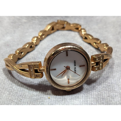 Anne Klein Gold Tone Watch With Rhinestones And Mother Of Pearl Face (Not Tested)