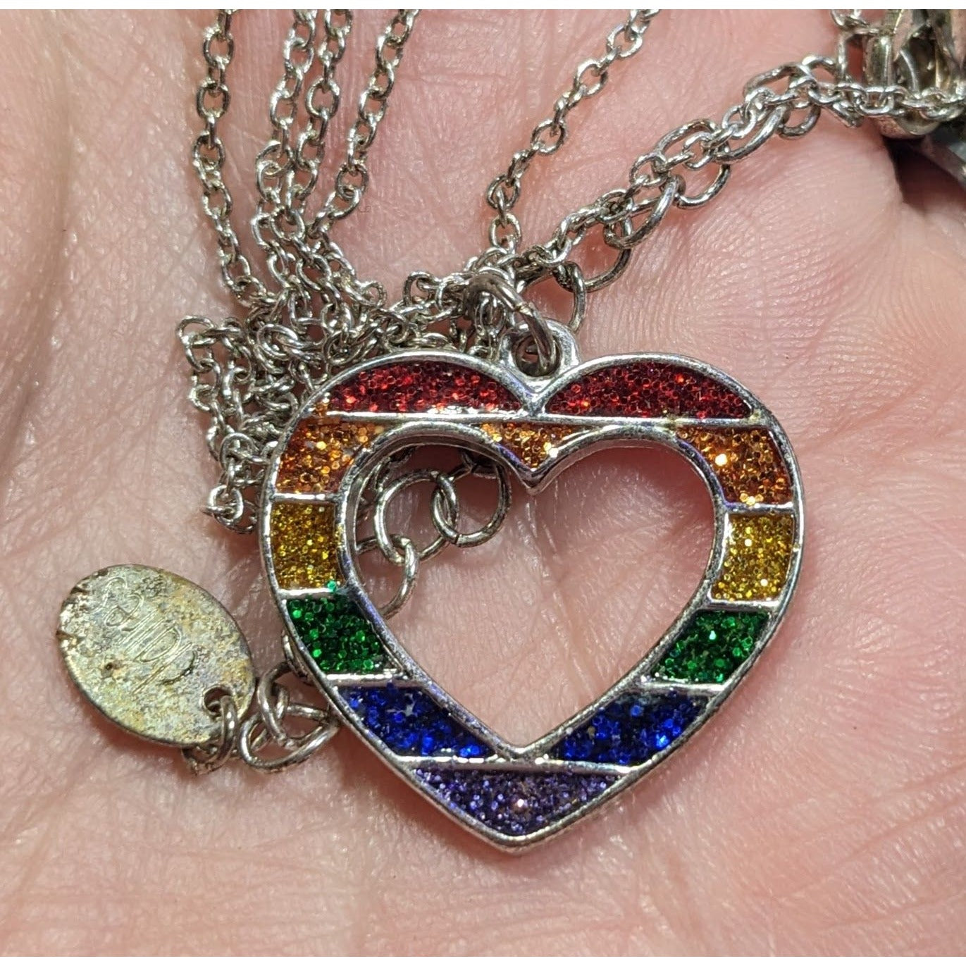 Claires Y2K Rainbow Glitter Open Heart Necklace