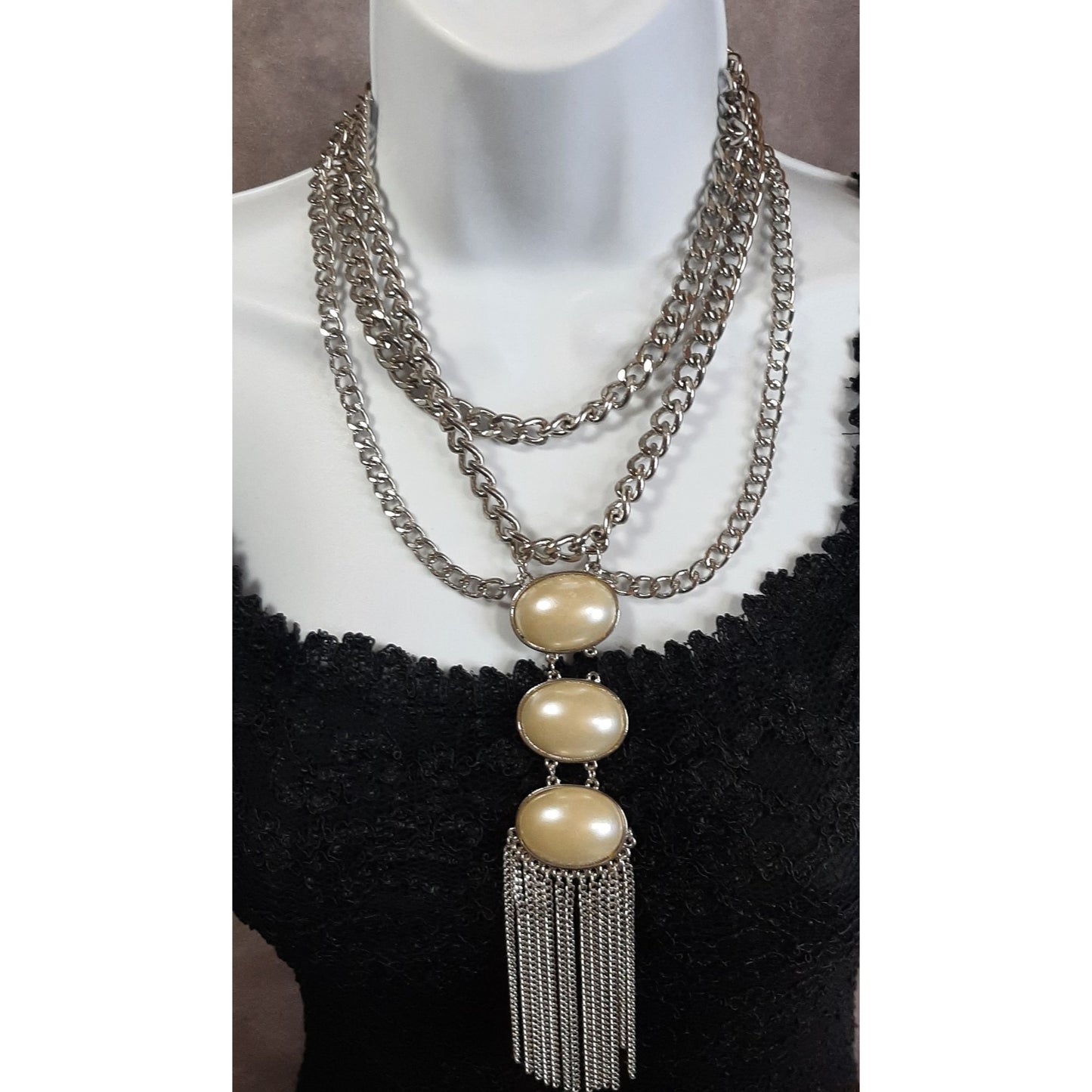 Elegant Layered Silver Statement Necklace With Faux Pearl Cabochons And Tassel Pendant