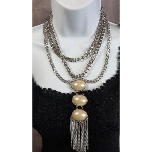 Elegant Layered Silver Statement Necklace With Faux Pearl Cabochons And Tassel Pendant