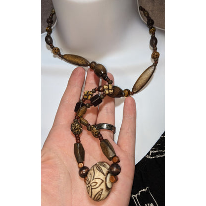 Vintage Handmade Rustic Beaded Necklace With Carved Floral Pendant