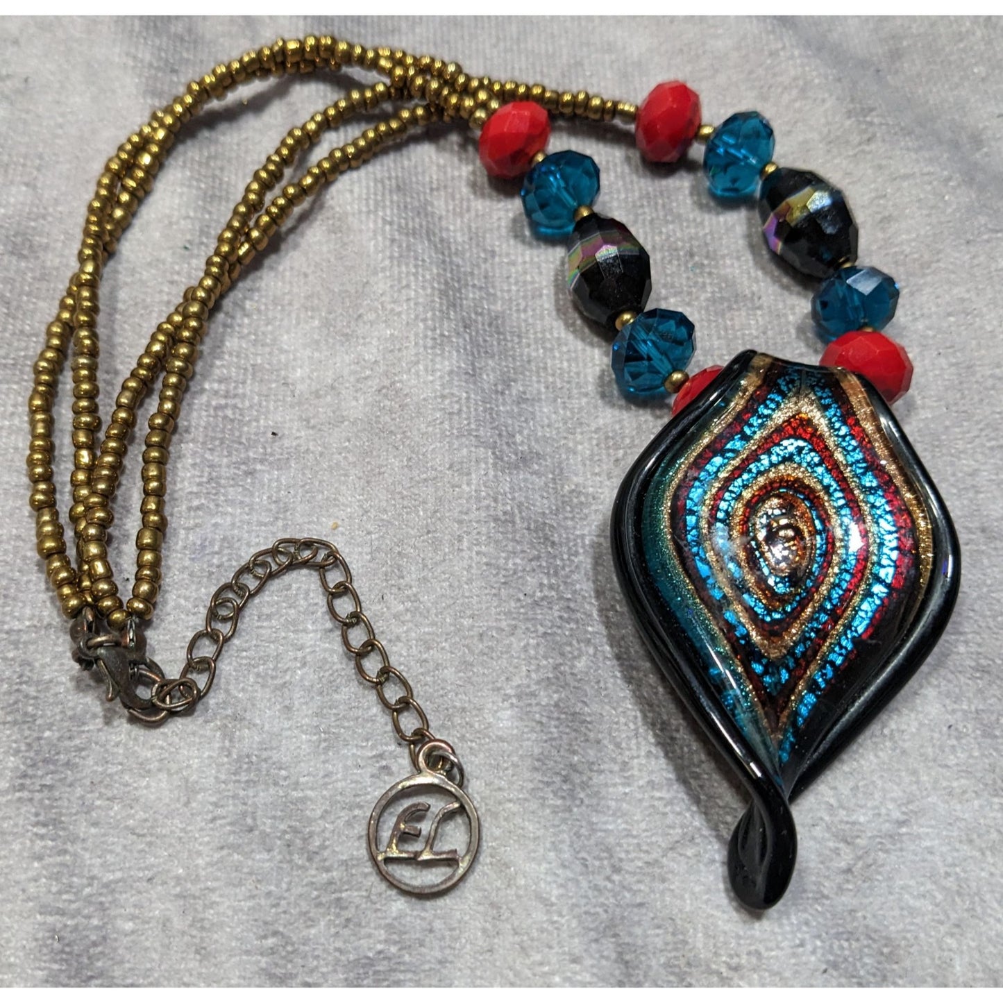 Erica Lyons Blue And Gold Tone Abstract Glass Necklace