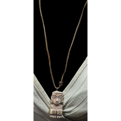 Tribal Pendant Necklace With Unique Figure Carving On Brown Suede Cord